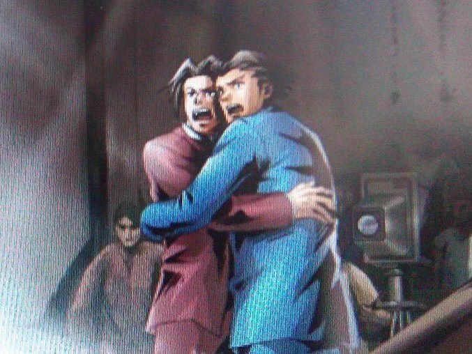 Miles Edgeworth and Phoenix Wright hug in fear in official art from Ultimate Marvel vs. Capcom 3