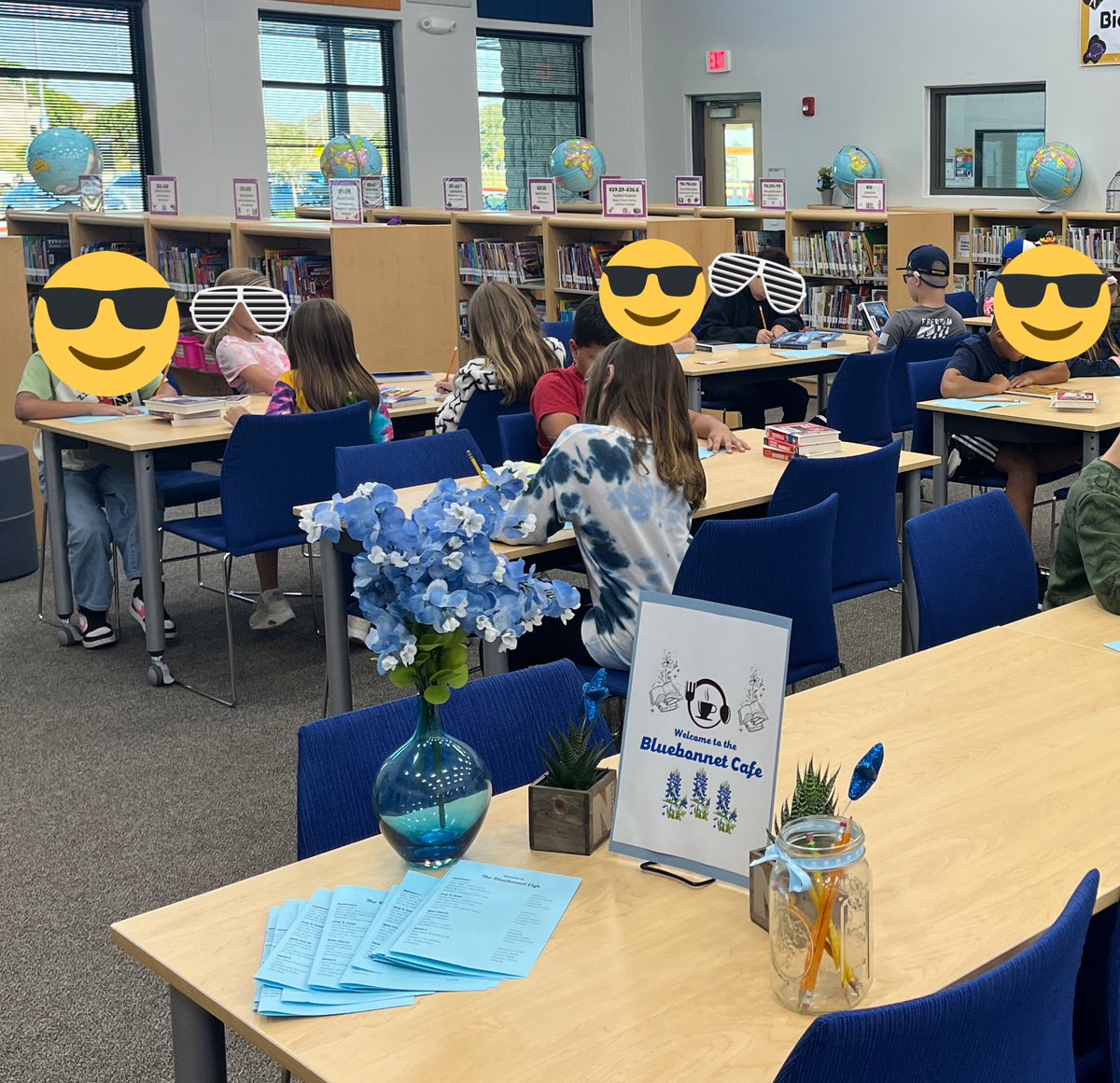 Navigator_Lib's tweet photo. The Bluebonnet Cafe is open at @CarolNorthES. Students are sampling this year’s @TBABooks nominated books and making plans for reading. #leanderisdlib #NavigatorsRead https://t.co/SyH6zBBeRs
