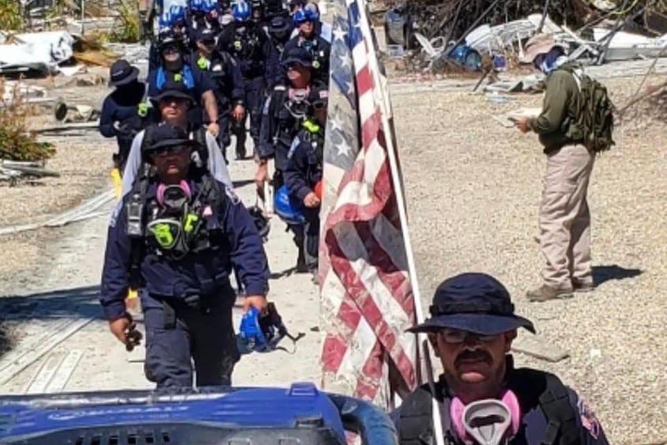 IN_Task_Force_1's tweet photo. The team and our force protection officers have been collecting damaged American Flags along the way to properly handle them in accordance with U.S. Flag code etiquette so they can be respectfully retired. The team also raised a new flag at the American Legion in Ft Myers Beach https://t.co/p1MG7AnBDQ