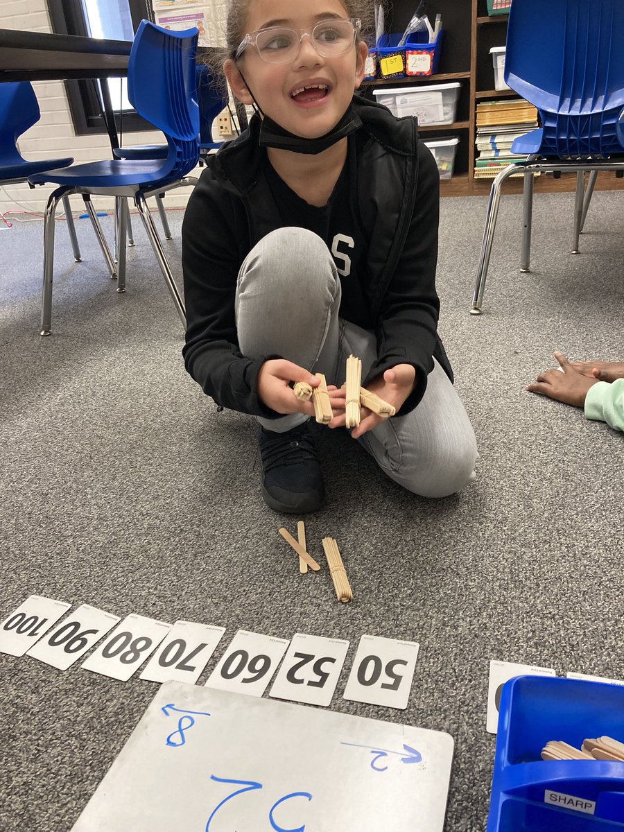Third graders explore multi digit numbers using numeral cards and craft stick models. So many great discussions on place value and number sense including “how many to the next decade?” <a href="/MLCmath/">The Math Learning Center</a> #LongfellowBears #D97