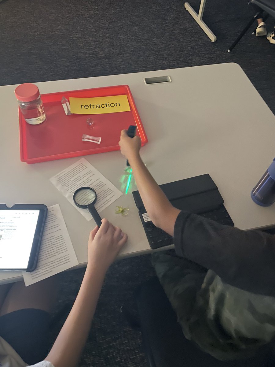 LISDScience's tweet photo. 5th grade students @HicksElementary investigating reflection and refraction, recording evidence with their iPad and embedding it into their digital notebook.@DigitalLISD https://t.co/ezyAWf4T82