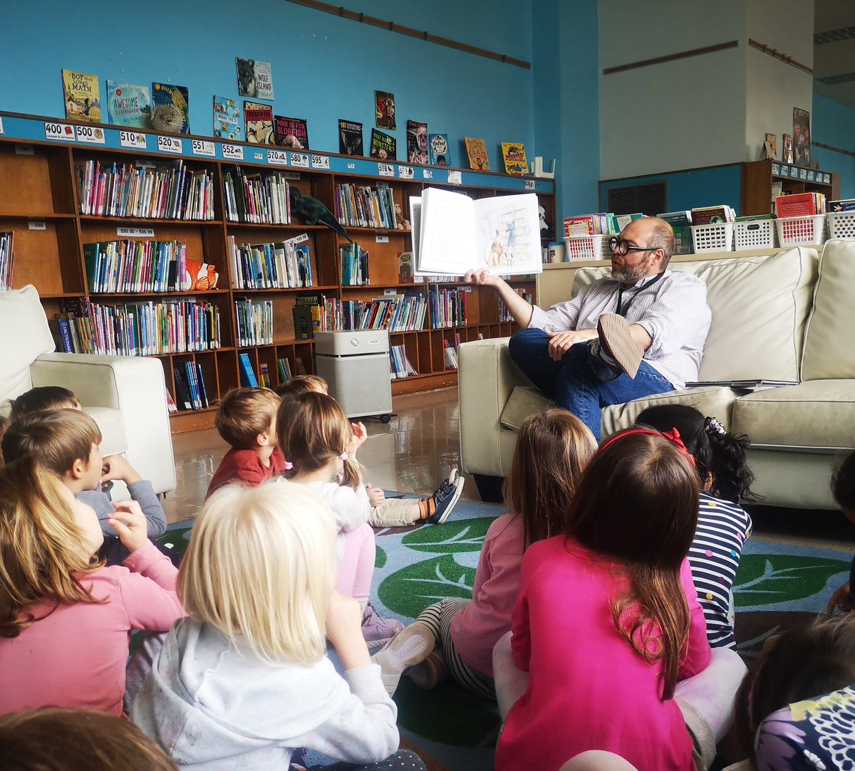MsGiovannaSalas's tweet photo. Students enjoyed a great story #LibraryLion read by Mr. Marshall in our school library. @TDSB_McMurrich https://t.co/d2OEpfYqkO