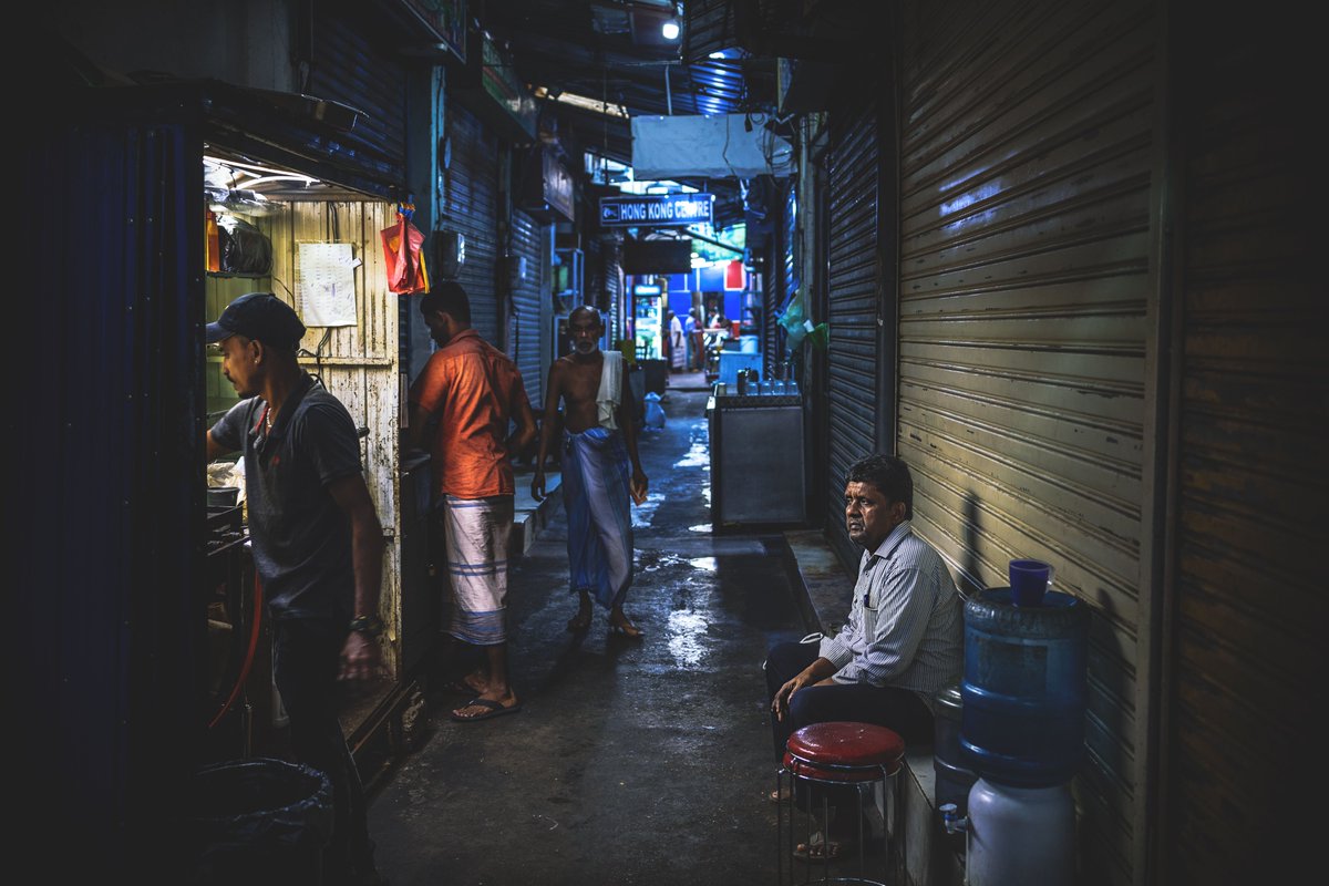 S_MorningLight's tweet photo. BREAKFAST IN #PETTAH
An early diner waits for his #rotti & tea on #KeyzerStreet. But at the end of the alley, #breakfast service is already in full swing. Sep 2022.
More@ https://t.co/DfNwrLS3tJ
#Canon #R6 & #RF35_1_8 courtesy @Canon_SL.
#streetphotography #CanonSriLanka #colombo https://t.co/fZX3gPoEVT