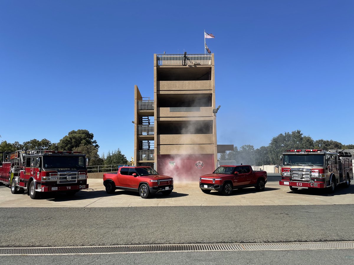 ContraCostaFire's tweet photo. Con Fire took delivery of two electric trucks from @Rivian today, the first green vehicles in our fleet. They will be utilized in our training division and fire prevention bureau. We are committed to preserving life, property and the environment for the communities we serve. https://t.co/f8EOskCGOO