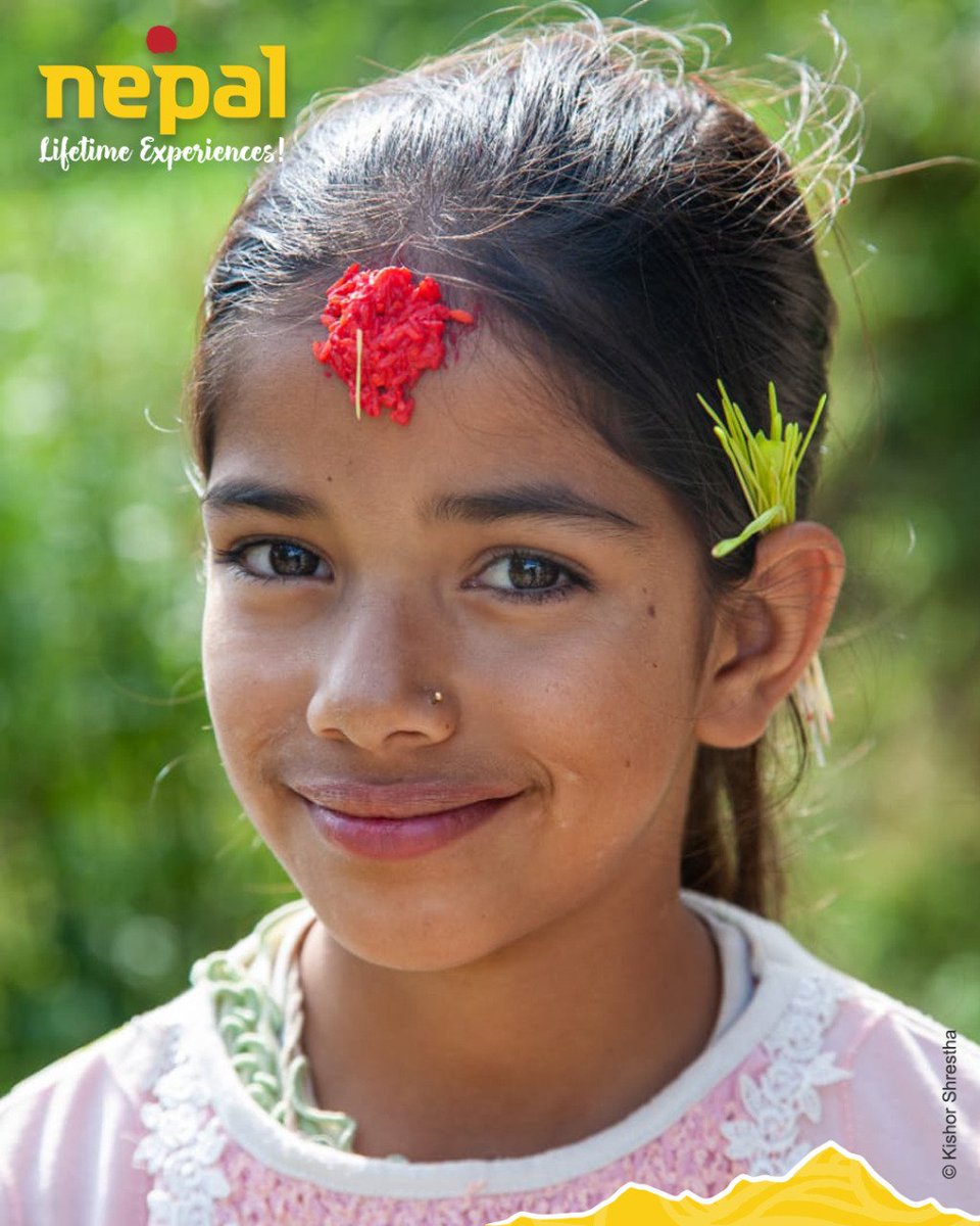 nepaltourismb's tweet photo. A young Nepali girl with #Tika #Jamara on the day of #BijayaDashami2079 smiles for the camera. Family reunion with blessings from elders is integral part of Dashain. Once again wishes for a Happy &amp; Healing Bijaya Dashami! Enjoy responsibly &amp; stay safe. #NepalNOW https://t.co/GI33RJMJQt