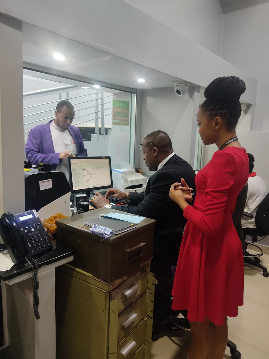 NCBABankKenya's tweet photo. Waweru Mathenge, Group Company Secretary and Head of Legal taking time to engage with our customers at our Kenyatta Avenue Branch #ServiceTheNCBAWay #sustainingcustomerinclusion #CustomerServiceWeek2022 https://t.co/sGLIpCEIME