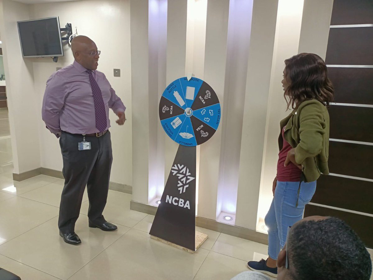 NCBABankKenya's tweet photo. Visit our Centre,House Westlands and Wabera branches to spin the NCBA Customer Service Week wheel and get fantastic branded merchandise. #ServiceTheNCBAWay #sustainingcustomerinclusion #CustomerServiceWeek2022 cc James Mugo, COO, Digital Business https://t.co/ZeY1tt7Rik