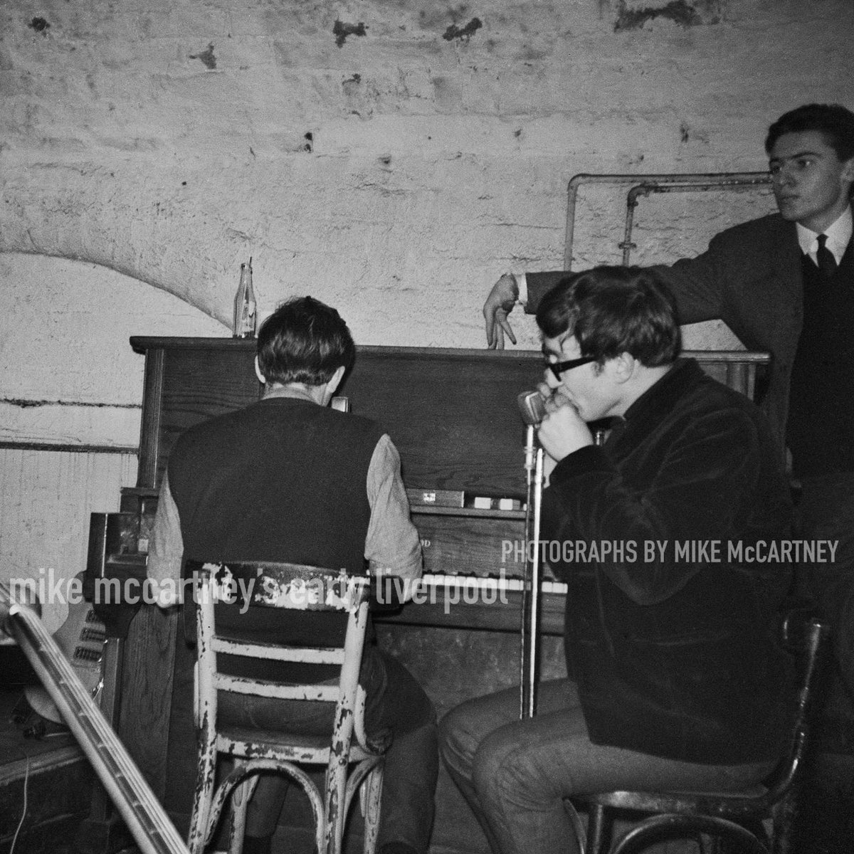 The Beatles' 'Love Me Do' turns 60 today! Released on the 5 October 1962. Pictured here: Paul McCartney and John Lennon rehearsing 'Love Me Do' at Liverpool's Cavern Club. From Mike McCartney's Early Liverpool | MikeMcCartneyBook.com⁣ #thebeatles #lovemedo #mikemccartney ⁣