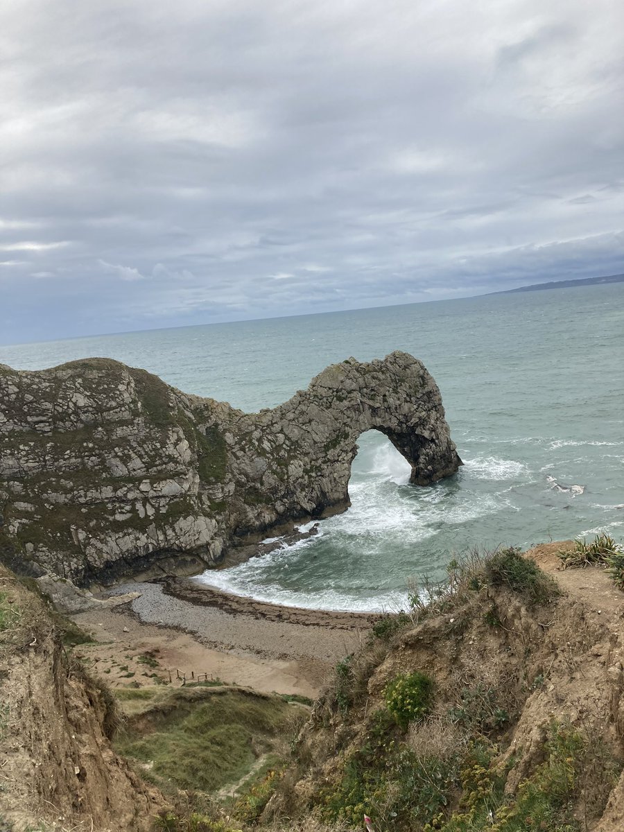 SibfordGeog's tweet photo. It may be 50mph winds and lashing with rain but we still love some #geographyfieldwork especially at beautiful Durdle Door @LulworthEstate @sibfordoxon #pagm https://t.co/ZFWgBO8stX