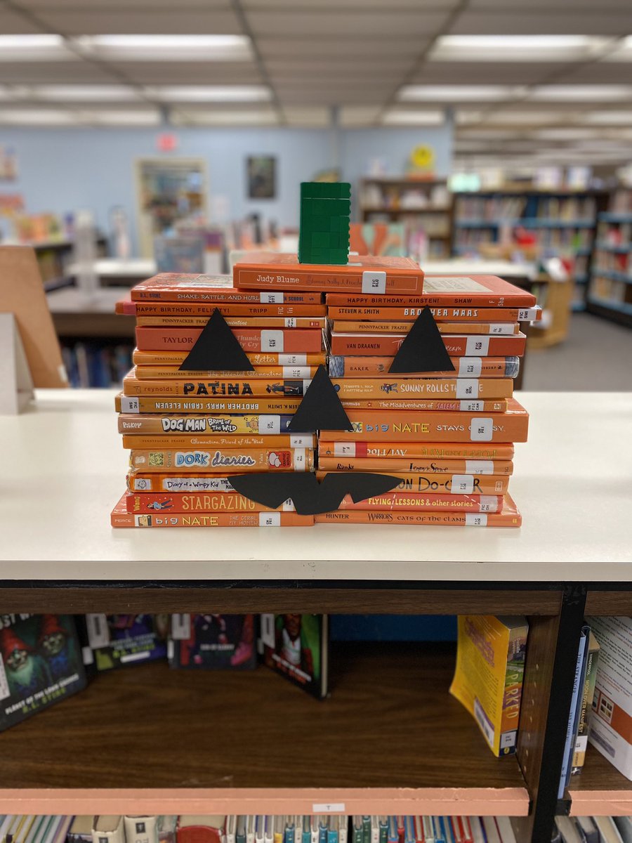 I love our new book display. It was created by <a href="/HardingAvenue/">Harding Avenue Elem</a> 5th grade students Carolyn, Nettie and Kate. Great work! Remember to carve out some time for reading, everyone! 🎃