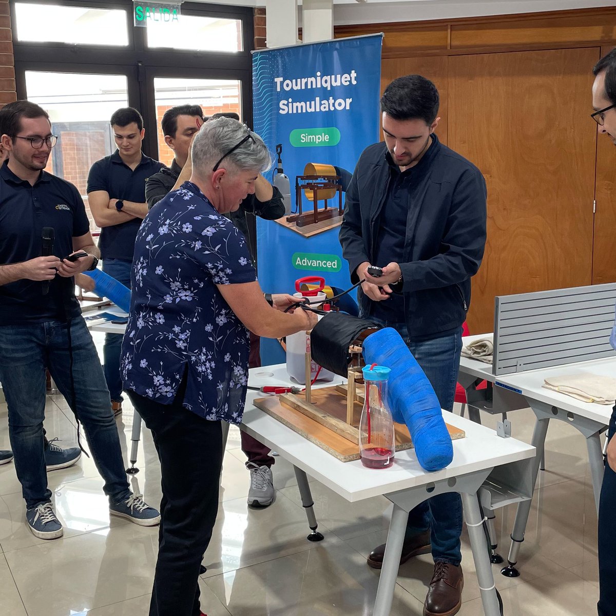 isabellaxfaria's tweet photo. Last week in 🇬🇹, we presented our low-cost tourniquet simulator to @IntuitiveSurg and I finally met the firefighters that inspired this project.

We hope our self-teaching app and simulator help improve access to quality prehospital training worldwide!

@HarvardPGSSC @crashsavers https://t.co/EM9N9HjQzL