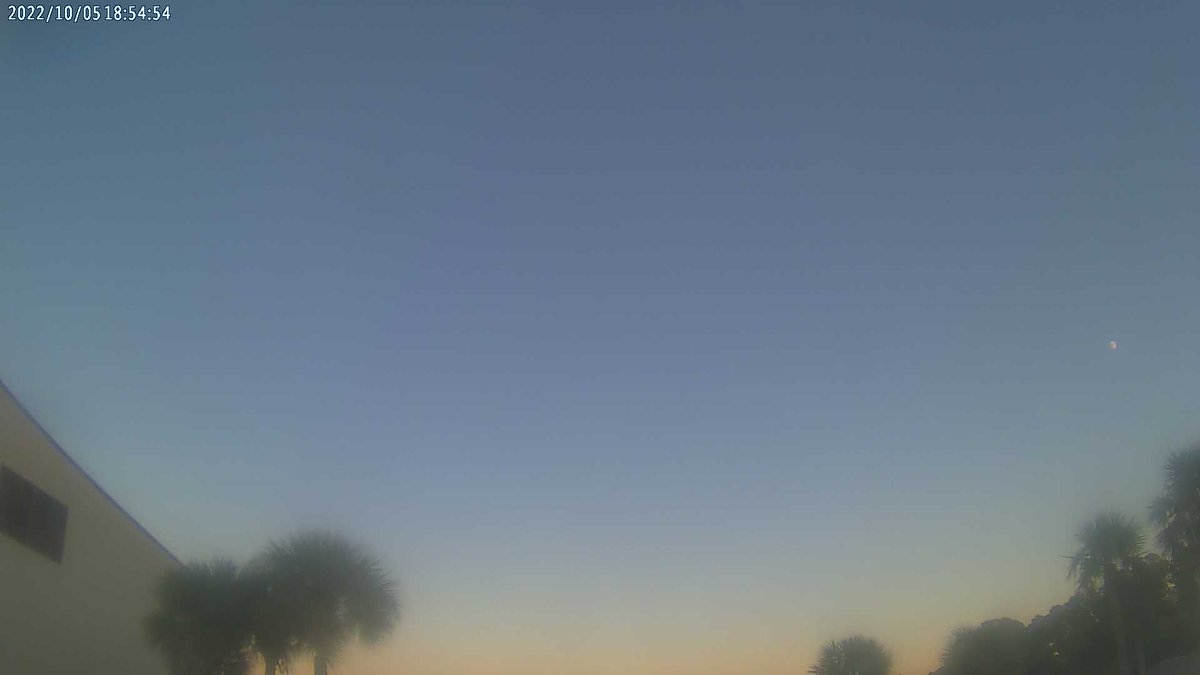 Buddy Taylor Middle School at sunset and it's 73 F.