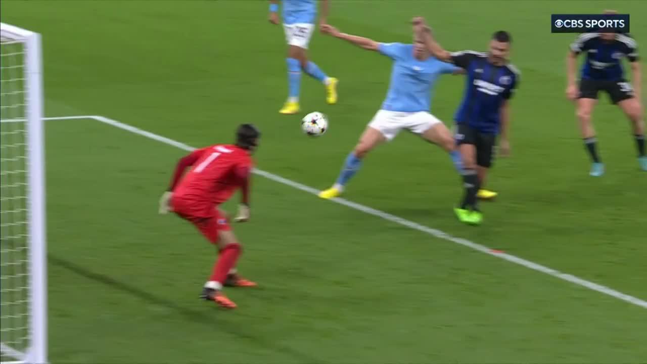 Manchester City get a third. Haaland isn't the official goalscorer but he pretty much forced the ball into the net. 😬”