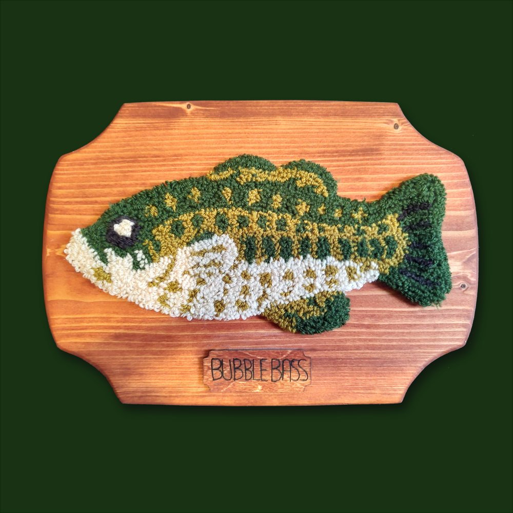 ItsKayBit's tweet photo. I don't post craft stuff up here but I think I'll start now~
Here's a #needlepunch fish guy I made for my BIL's birthday 🐟
It's inspired by the old singing fish people would have on their walls~💛🦈
Name is a little scuffed but not bad for an overnight project
#rugmaking https://t.co/unBTR7jcho