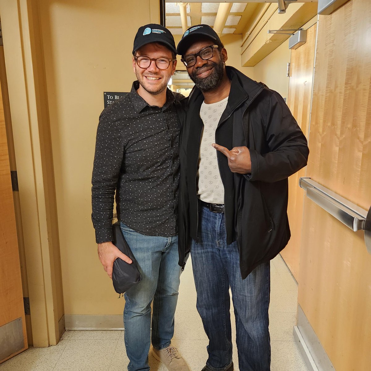 commshakes's tweet photo. Our Access Advocate, Christopher Robinson, ran into Actor/Director James Caverly of @OnlyMurdersHulu at the George W. Veditz ASL Festival. Don't they look great in CSC Teal? #HandShakes #DeafArtists #ASLart #CommShakes https://t.co/y4hGjnfpio
