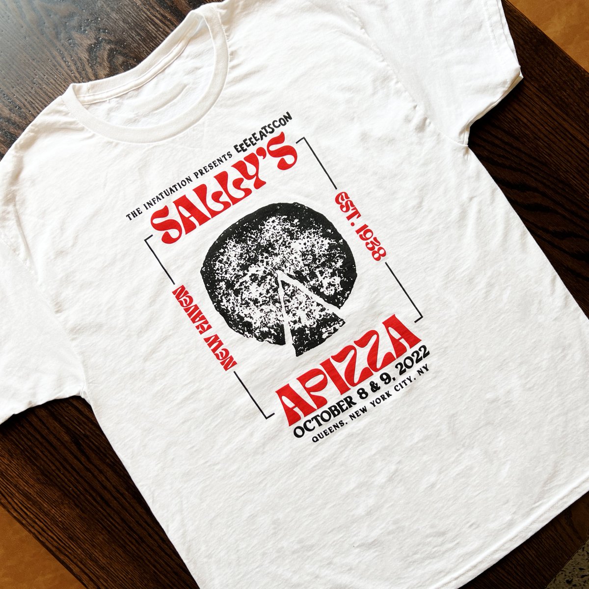 sallysapizza's tweet photo. EEEEEATSCON by @infatuation  IS THIS WEEKEND!! Come say hey, grab a slice or three and snag our special EEEEEATSCON t-shirt commemorating the first time we’ve ever served apizza in the big apple. https://t.co/jBlOUbN8J6