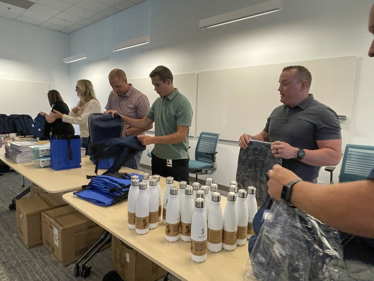 BenBrownSLC's tweet photo. It was great to be back in the office to learn more about @RESCUEorg SLC! Today volunteers took time to learn more about the organization and created work backpacks for the individuals they serve. #FidelityCares2022 #FidelityAssociate #FidelityUT https://t.co/eQf78gMwyy