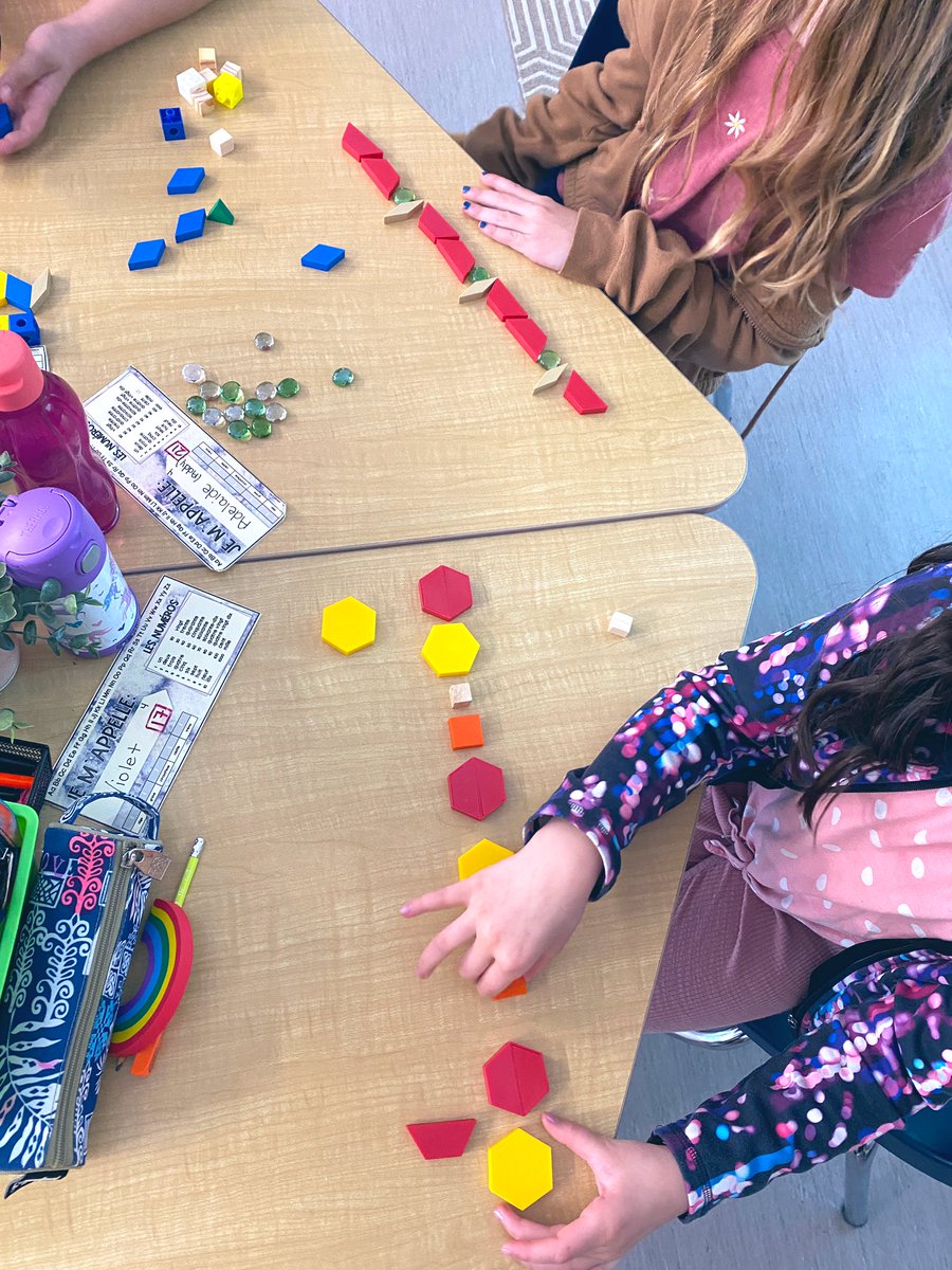 Today, our #mindson activity was to create complex repeating patterns with multiple changing attributes, after reviewing what an attribute is and co-creating a list of attributes. Then, we dove into authentic group action tasks before individual practice. #math @shcsparis