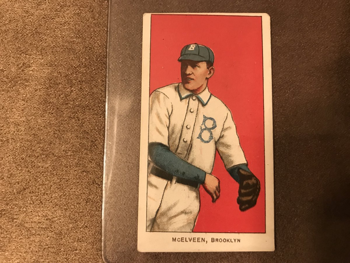 TheSlidingBilly's tweet photo. @DodgerDoggo It looks trimmed at first glance but it isn't, it's a diamond cut. I lined it up with a few that are 100% not trimmed and they were the same size. I'd have given it an 8 if it wasn't for that issue. https://t.co/NtgwYJ9XlW