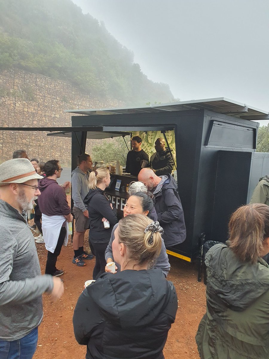 Backsberg's tweet photo. Bright eyed and bushy tailed to kick off Day 2 of @CapeWine2022 in the very best company! @WOSA_ZA #Sustainability360 #DGB #SunriseHike #visitcapetown https://t.co/kZO0IzvTuA