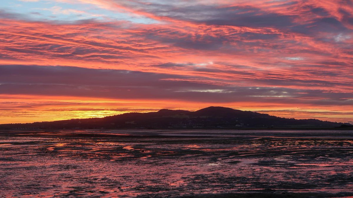 Memories from #thisdaylastyear of these stunning skies over the Howth Peninsula taken from Bayside.