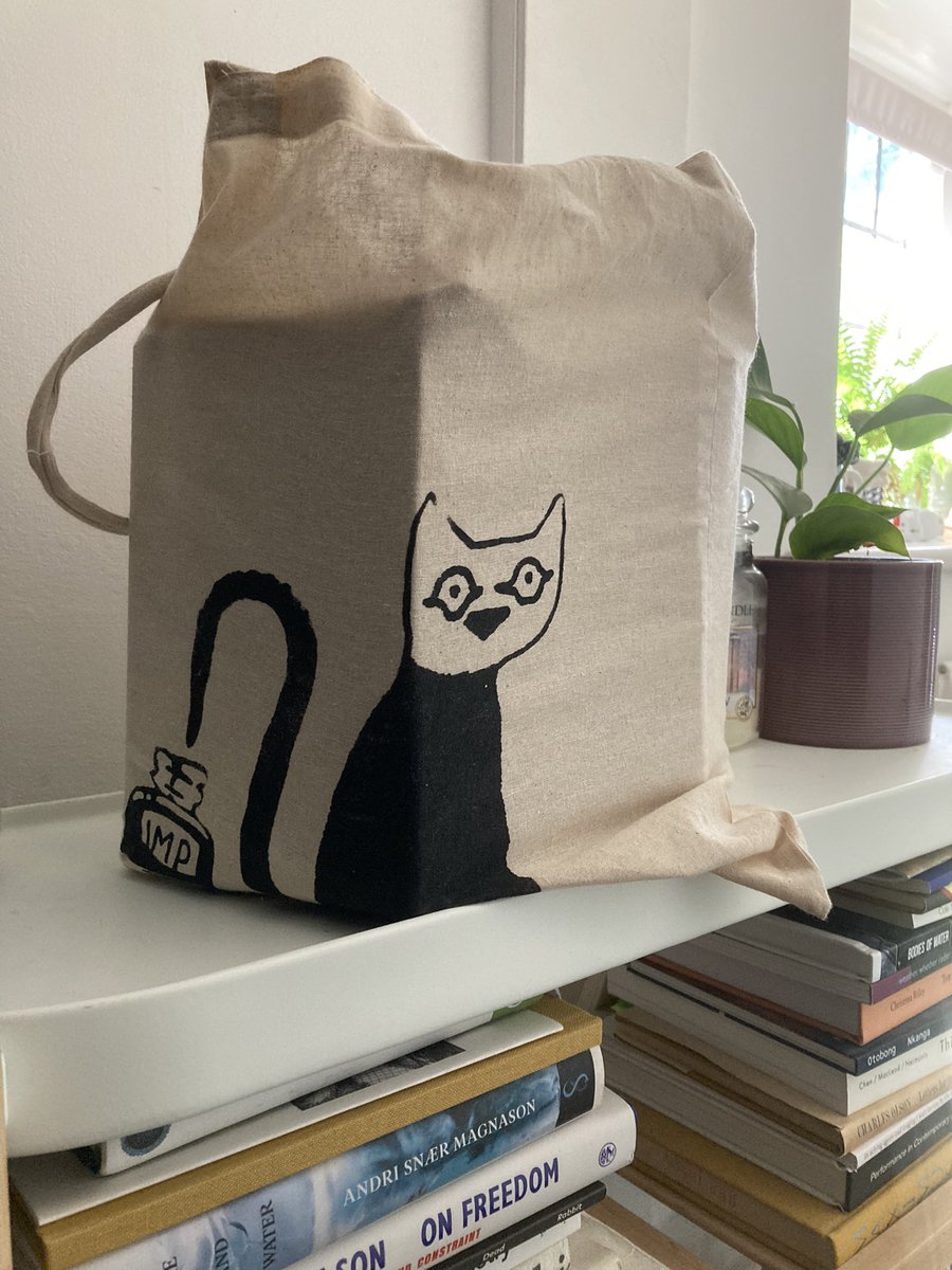 brihughespoet's tweet photo. Delivering new @OsmosisPress orders to the post office in my #Impact12 @CFPRresearch tote bag 🐈⬛ https://t.co/HpdASnPbjz