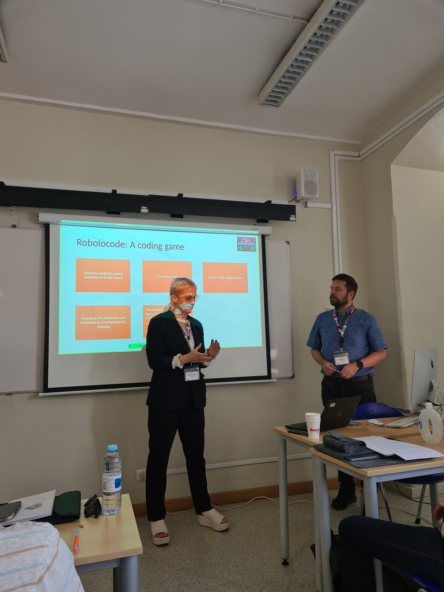 Hamingjan's tweet image. The @robolocode
game was presented in the game competition at #ECGBL2022 just now. Many thanks to @stahl_matilda for this... eh... informative photo of the presenters 😅
#ecgbl22 #codinggames #gamedev