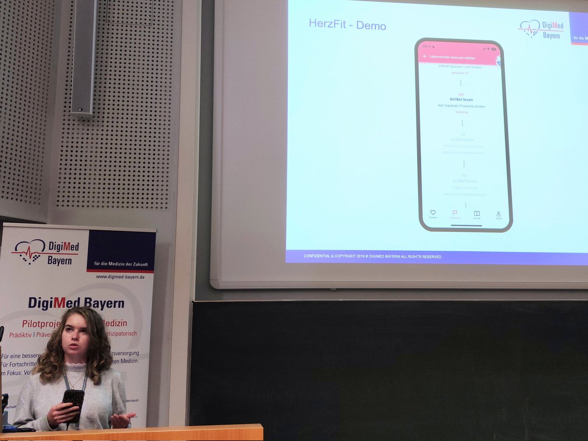 DigiMedBayern's tweet photo. Very impressive live presentation of the #Herzfit-app on our DigiMed Bayern Symposium by @laramariereimer &amp; Fabian Starnecker.📱The app enables users to digitally and individually manage their own heart health to prevent ❤️‍🩹 cardiovascular diseases like heart attack or stroke. https://t.co/ZAa4vI8lRh