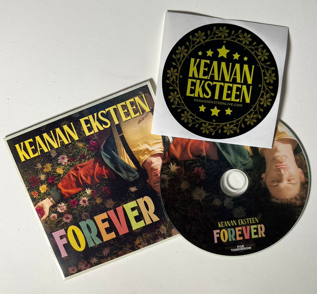 'FOREVER' CD's and KE stickers now available at live concerts 💛