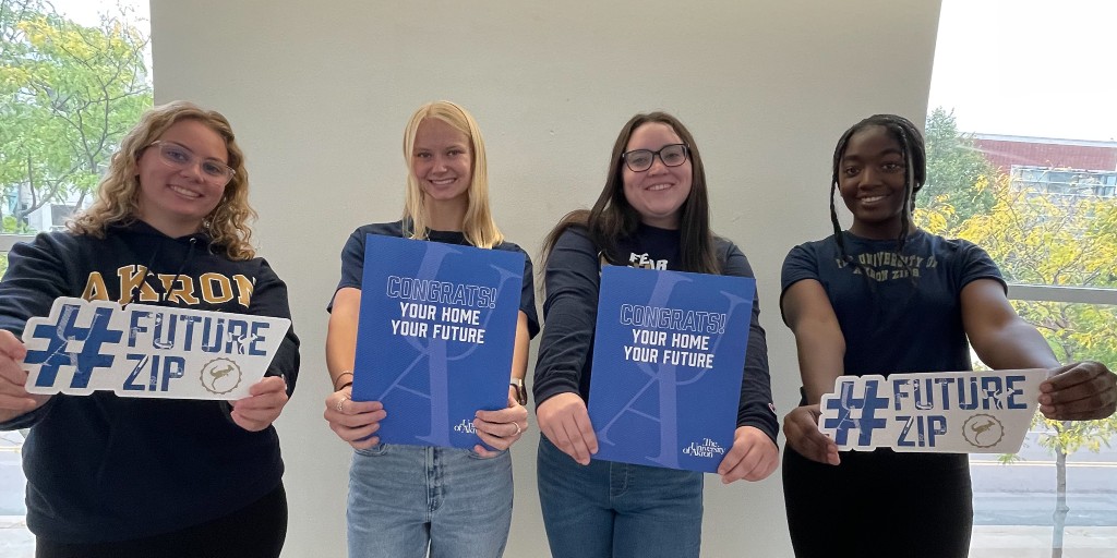 uakronadmission's tweet photo. Acceptance packets are out for delivery! 💌📬 Try this pose with your acceptance packet &amp; tag us! 📸

We can't wait to see #FutureZips on campus next fall. 🦘💙  Apply now &amp; get an admissions decision in two weeks. All month long, you can apply for FREE! Just use the code, Zippy. https://t.co/ZuWVUS7EAM