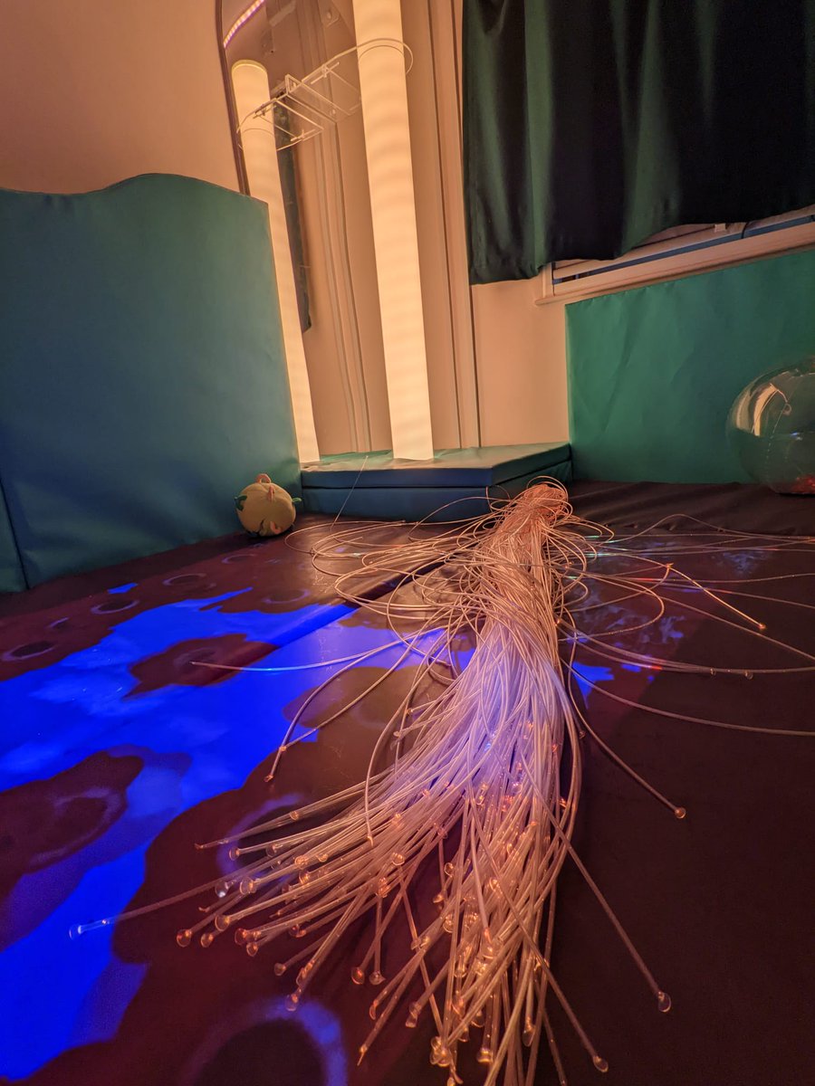 We've updated our sensory room and got a magic carpet (interactive projector) that we've all been having a lot of fun with!