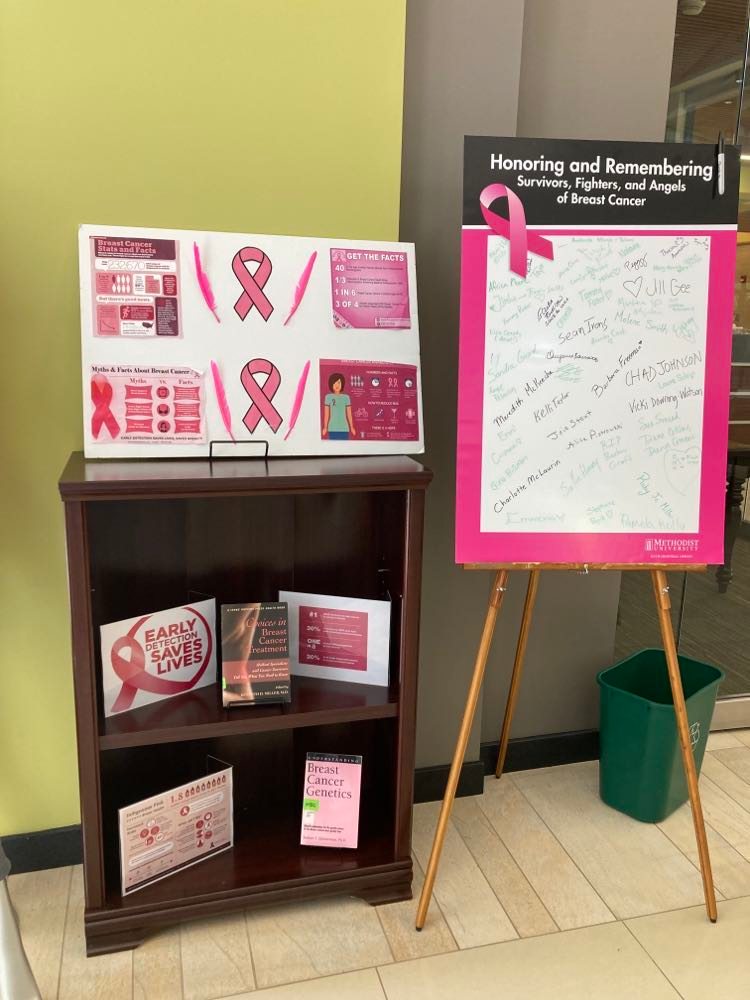 MUDMLibrary's tweet photo. October is Breast Cancer awareness month! Stop by the library and check it out and sign the board if you wish too. Remember to wear pink on Wednesday's to support Breast cancer awareness! https://t.co/ppEavZTQhD