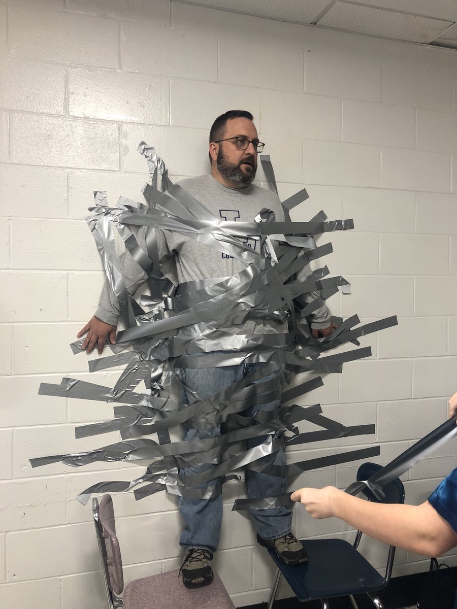 LedyardKeyClub's tweet photo. Some scenes from todays “Tape Wiz to the Wall” fundraiser during lunch. Many smiles from students and faculty today. Thank you to everyone who participated. Stay tuned for more Key Club events this year! https://t.co/OV1gVYKTjh