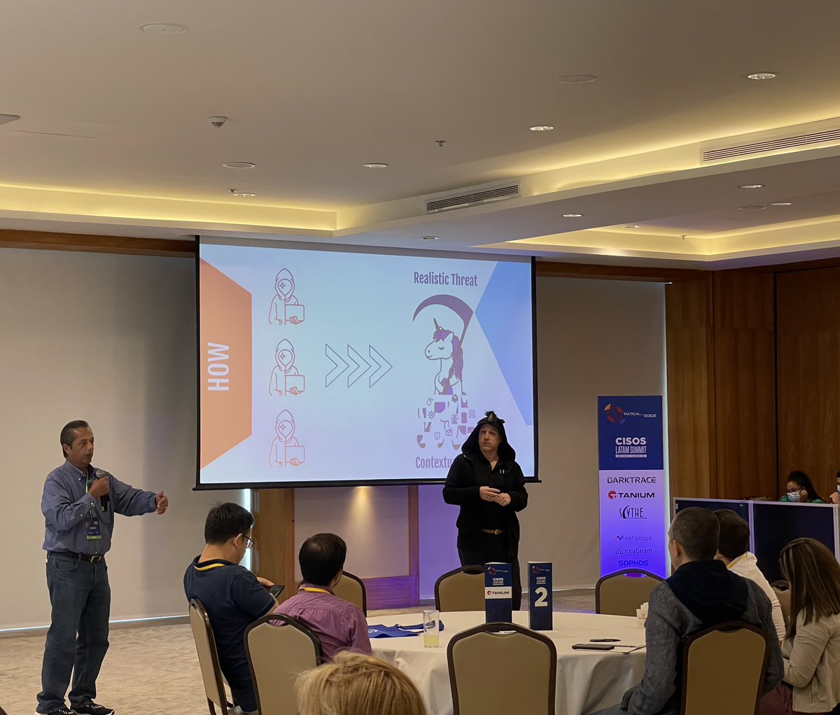 LawyerLiz's tweet photo. 🦄Magic: Kicking off the second day of a packed house at @Tactical3dge #CISOSummit #LATAM with @brysonbort &amp; @scythe_io https://t.co/sN4oNzagyG