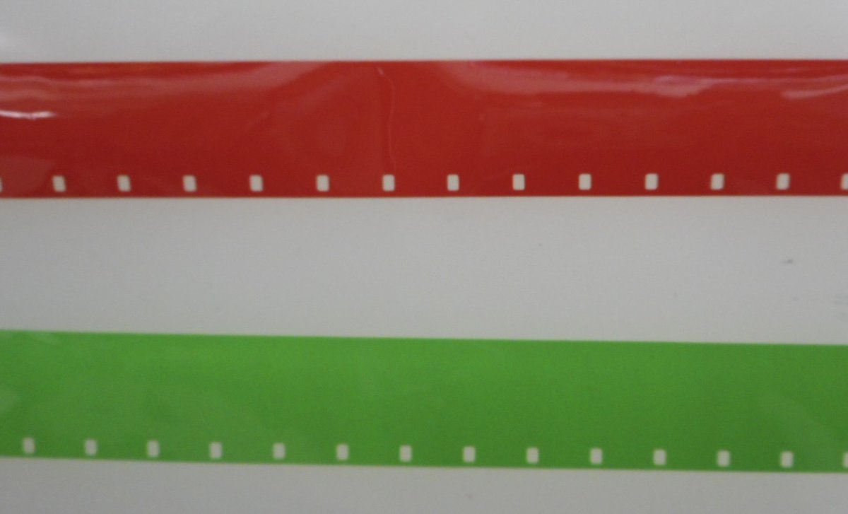 We like the simple symbolism of green leader=head, red leader=tail in old circulating film collections.