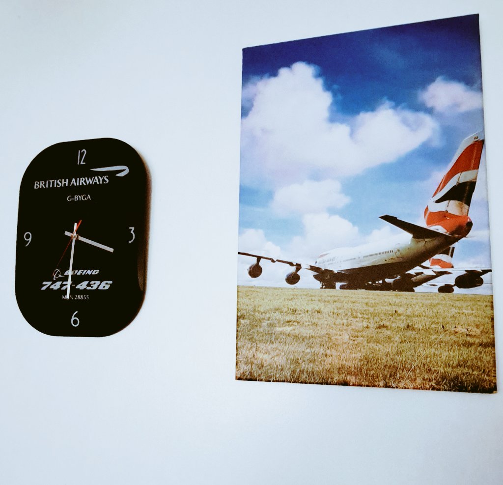 peter532's tweet photo. Finally @British_Airways @scottiebateman @DaveWallsworth @shesgotwings777 @Aerotiques the window clock has arrived, proudly on my wall next to B747 G-BYGA a photo I took of her at @Cardiff_Airport during storage in summer 2020 #Queenoftheskies #BA747 #aviationhistory https://t.co/9ik4L84ujr