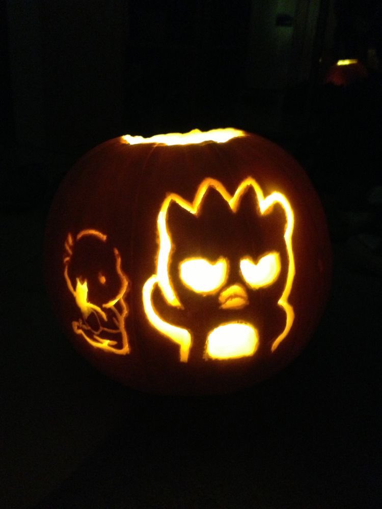 Sanrio Daily On Twitter badzu Maru And Chococat Pumpkin Carvings the-face-of-a-person-wearing-a-hat-with-eyes-and-nose-drawn-in-black-ink