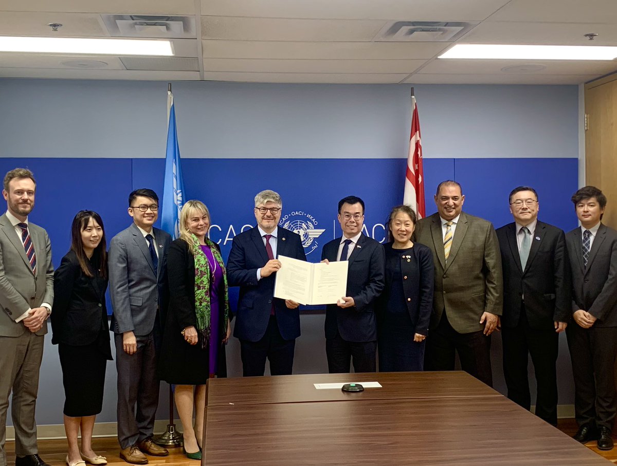 icao's tweet photo. On the sidelines of #ICAOA41, Singapore 🇸🇬 signs the the ACT-SAF Terms & Conditions. These establish the framework for mutual cooperation between ICAO and partners for the development and participation in the #ACTSAF Programme. ICAO encourages all States to agree to the T&Cs! https://t.co/QHZE7aiZKX