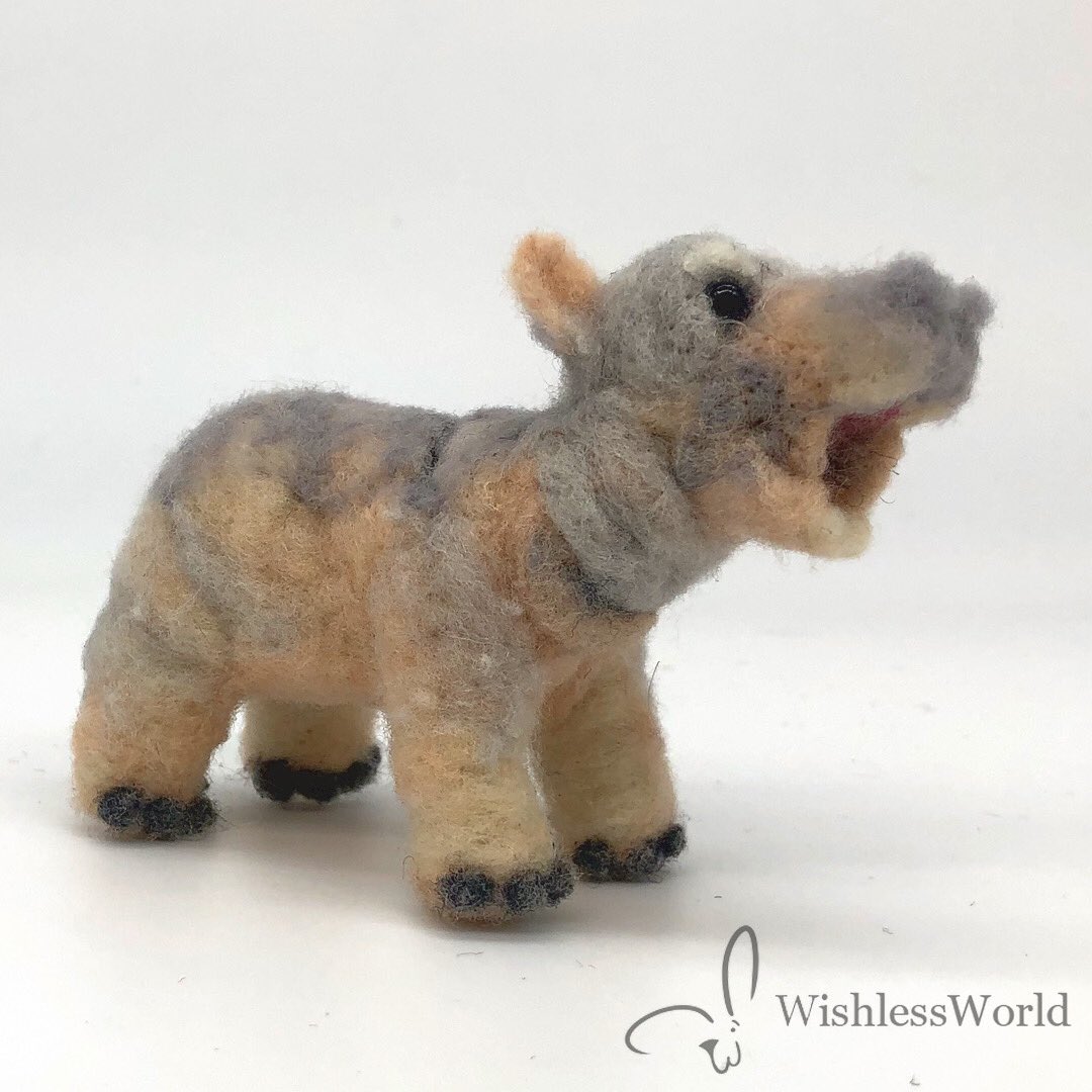 A few years back a baby hippo named Fiona showed up all over my Facebook and I made a felt of her. Well, now she’s grown up and has a baby brother named Fritz so I had to make him too.

#needlefelting #babyhippo #fiberart