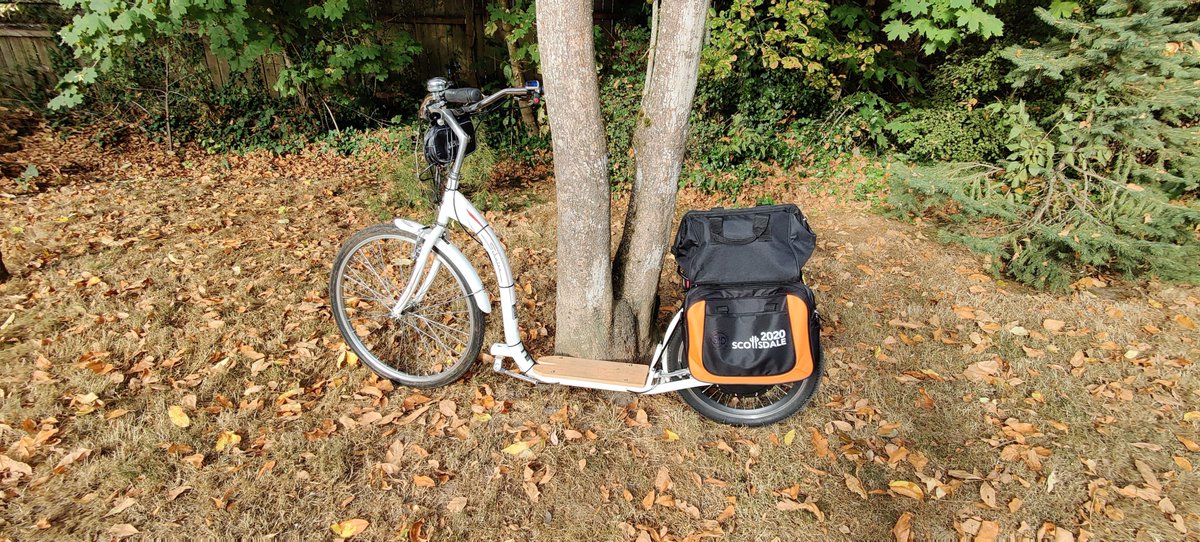 RescueEwe's tweet photo. Picked up these DIY panniers at @SCRAPPDX for $1.50 each! Cut the shoulder strap and attached with a few zip ties. DIY #eScooter project is coming along! #eMicromobility https://t.co/pN2YX9GB2t