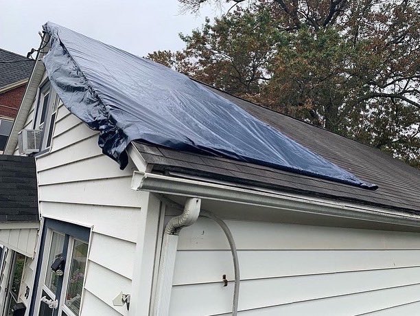 Emergency call out to tarp a roof due to storm related damages. Wind blew shingles off the roof causing water to leak into the home. There was also extensive damage to the living room and crawl space.