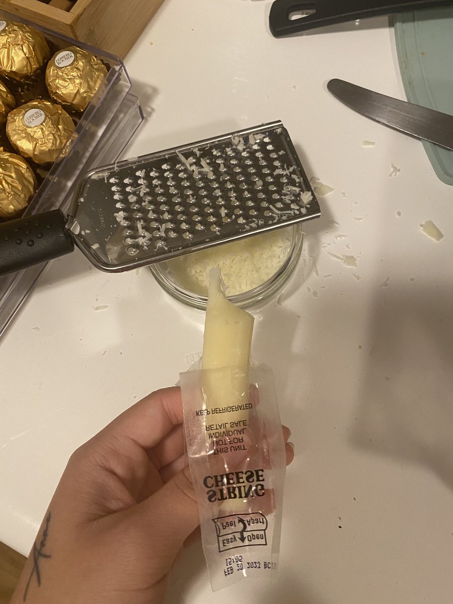 httpnhev's tweet photo. got too high started grating the mozzarella from the cheese sticks https://t.co/s418eHpVEZ