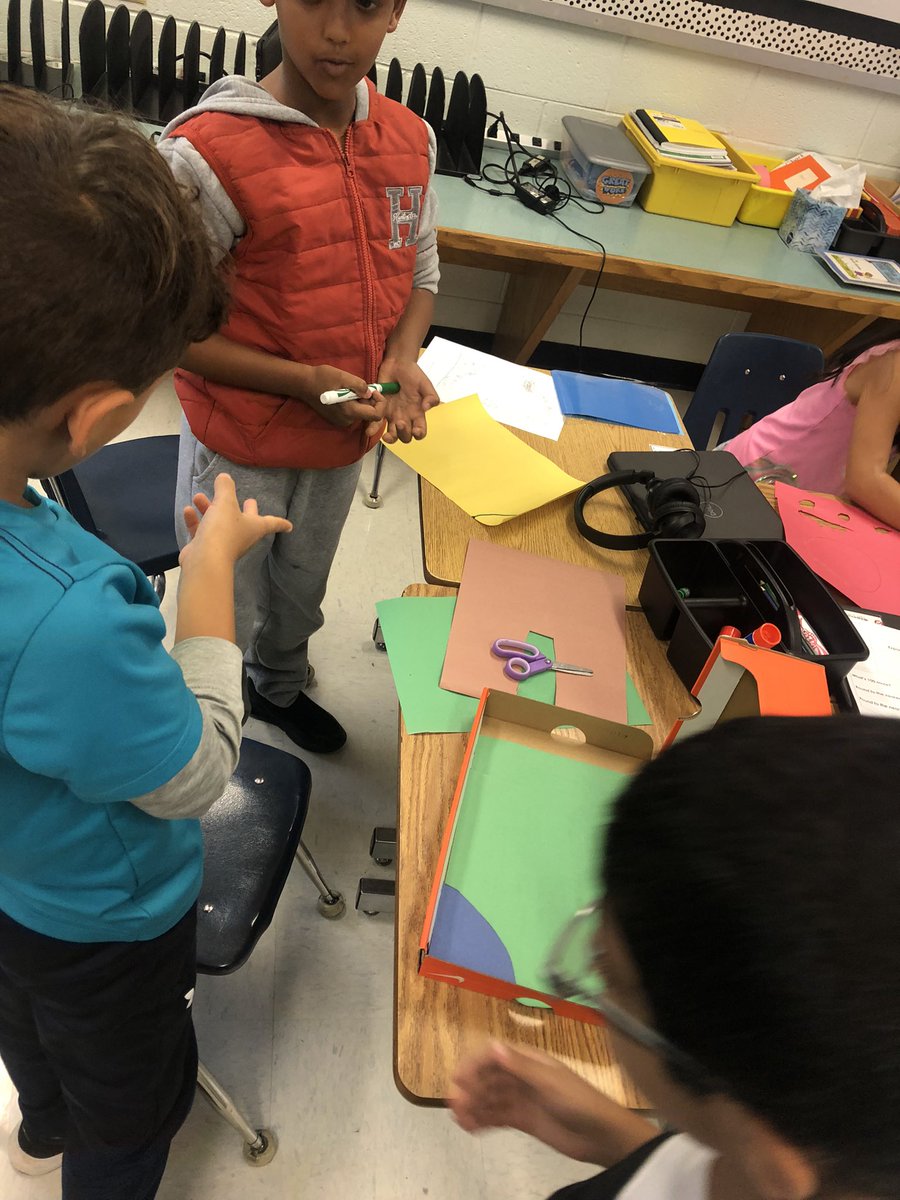 Lots of great teamwork happening while our Scientists work together to design their ladybug exhibits!