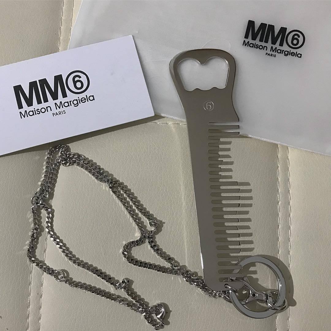 iso_inn's tweet photo. Maison Margiela MM6 necklace bottle opener &amp; comb. https://t.co/JbCesytS23