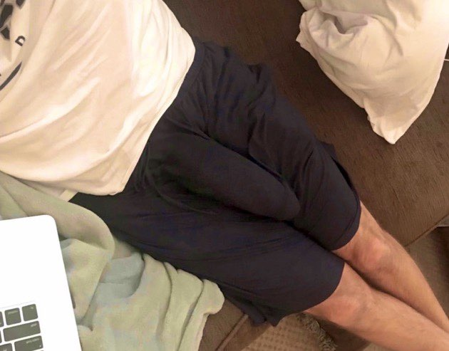 Don't mind him, he's just lounging around with his dorm room door wide open.