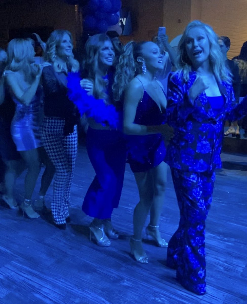 Kathy Hilton leading a massive conga line with Ashley Darby, Teresa Giudice, and Whitney Rose. How is this real??