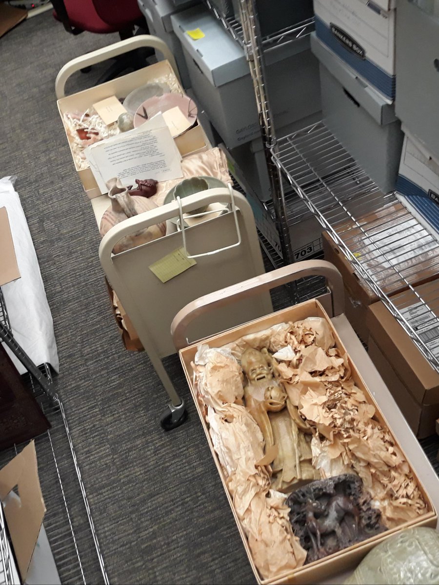 bibliotudinous's tweet photo. During renovations at the library, they removed a wall and found a huge display case behind it. Its lights were still on (since the '60s), and it was filled with all sorts of precious artworks, including Greek, Roman, Native American, jade and ivory objects, etc. #librarylife https://t.co/Yu2OkCv0nc