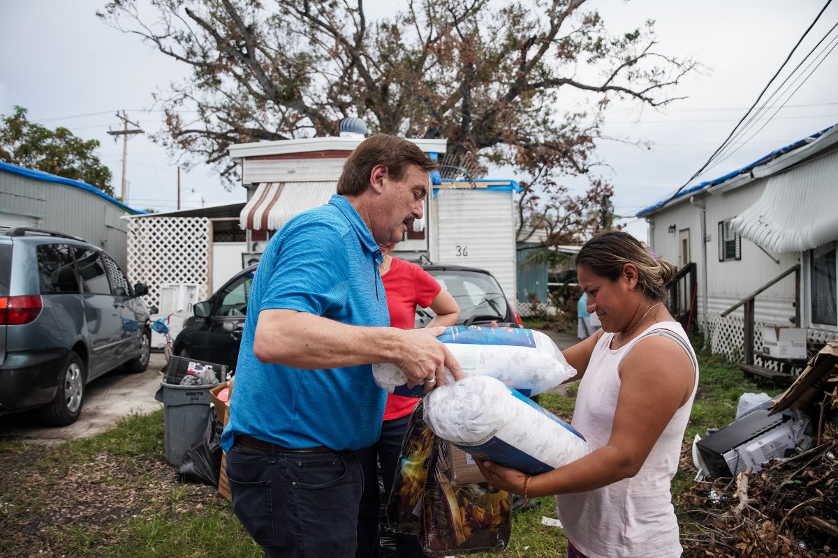 Franklin_Graham's tweet photo. I appreciate Mike Lindell going to Fort Myers, FL, today to deliver 9,000+ MyPillows &amp; 2,000 of his blankets for victims of #Ian. These will mean so much to people who have lost everything. He even brought children’s pillows that have a Bible story picture. @SamaritansPurse https://t.co/GBcLI2ov5z