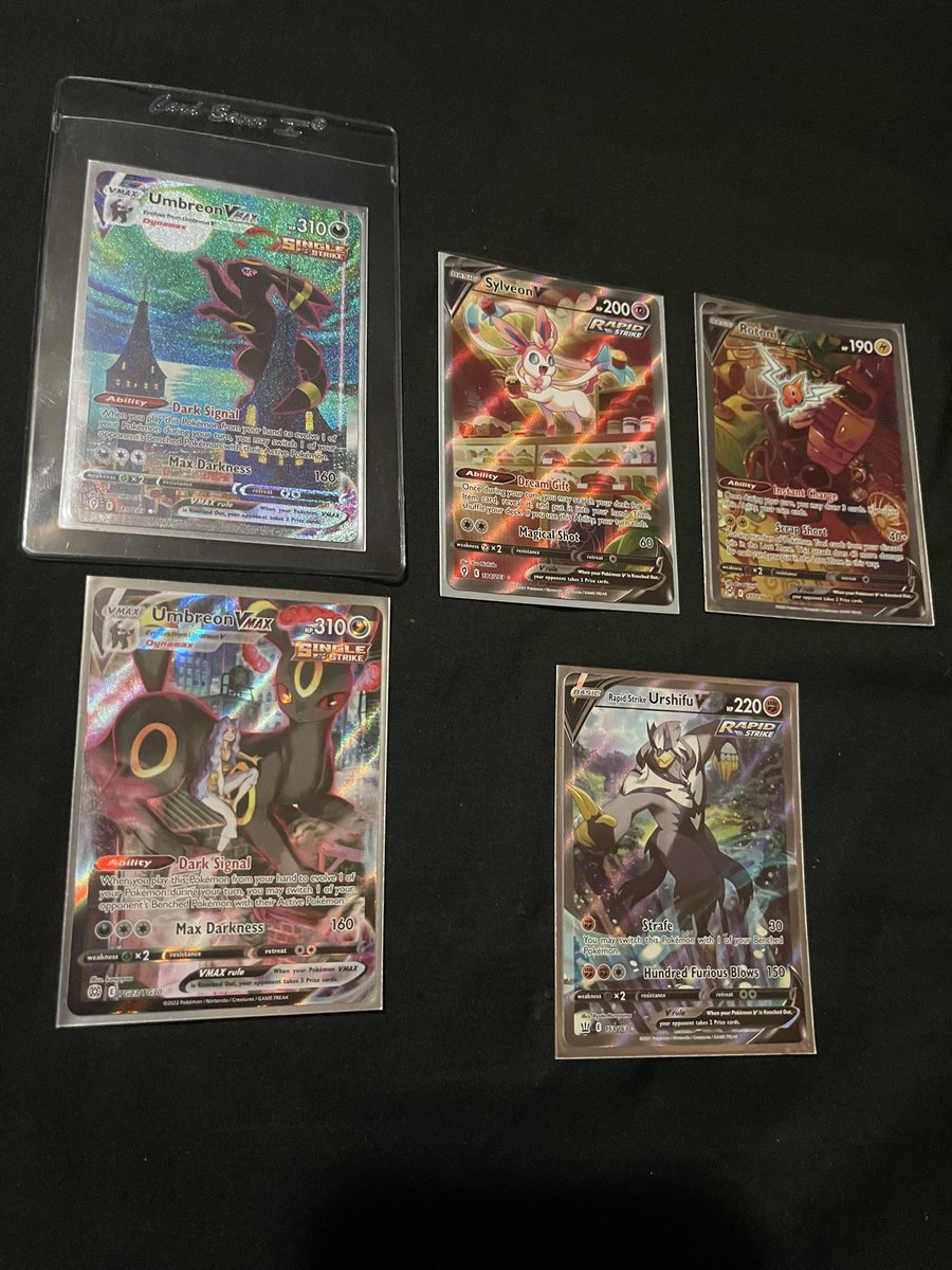 _Kmoney923's tweet photo. My Pokémon card pulls these past few weeks @pokemon #Pokemoncards #moonbreon #reachingforthemoon #mooncat #umbreon #cardpulls #boosterbox https://t.co/cUmNC2nHf4