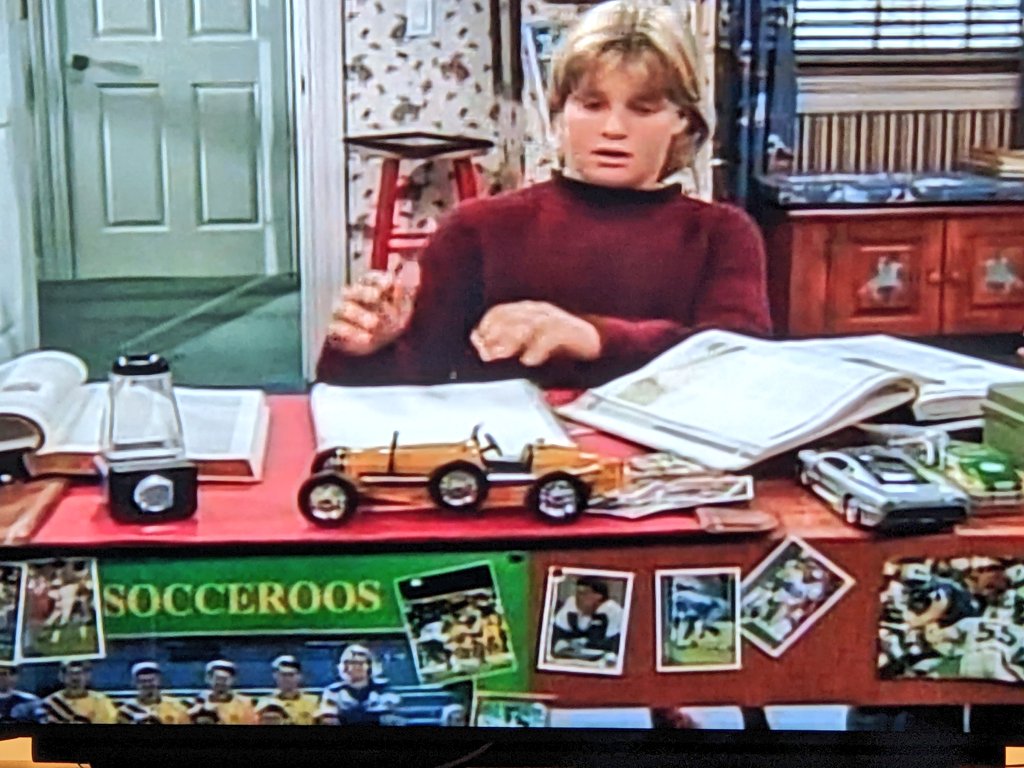 robbie_f84's tweet photo. Random discovery of the day...watching #HomeImprovement (S4E12, 1995), Bradley Taylor has a @Socceroos poster from 1993 😄 Young fella was clearly a fan of the green &amp; gold! https://t.co/1reiRYvwWz